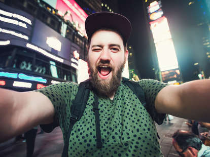 Tourist selfie in Time Square New York City