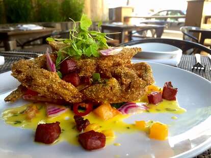 Jumbo Softshell Crab, with Tomatoes, Spicy Peppers, Striped Beets, Tasso Ham and a Yellow Tomato Vinaigrette