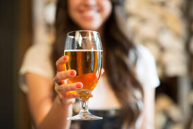 woman with glass of beer