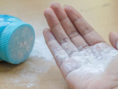 Man holding baby powder