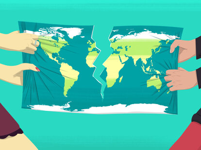 Two people tearing world map apart