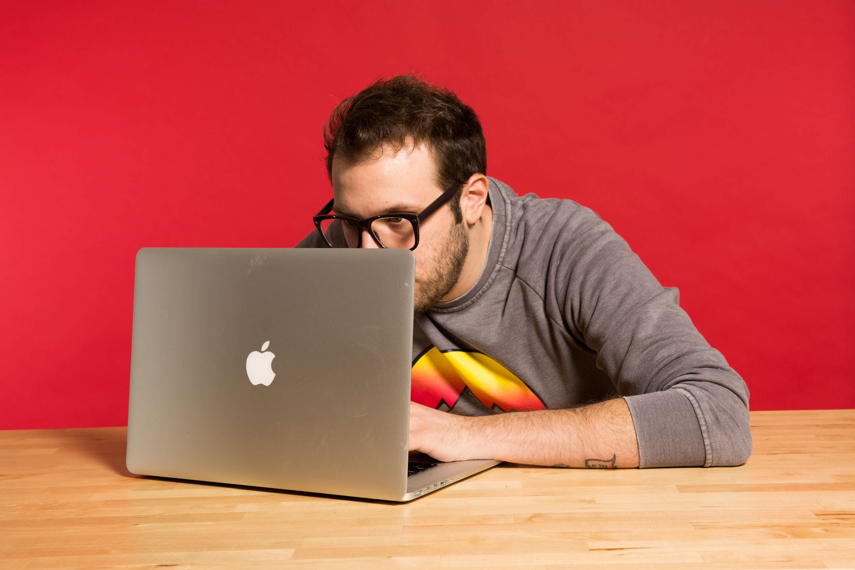 man staring at laptop