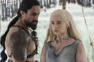 Emilia Clarke as Daenerys Targaryen, who was held captive by the Dothraki Khal Moro played by Joe Naufahu