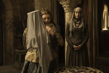 Natalie Dormer as Margaery Tyrell embraces Diana Rigg as Olenna Tyrell after her penance