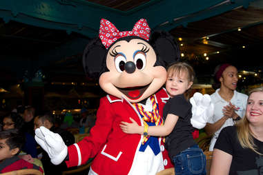 Minnie Mouse and child