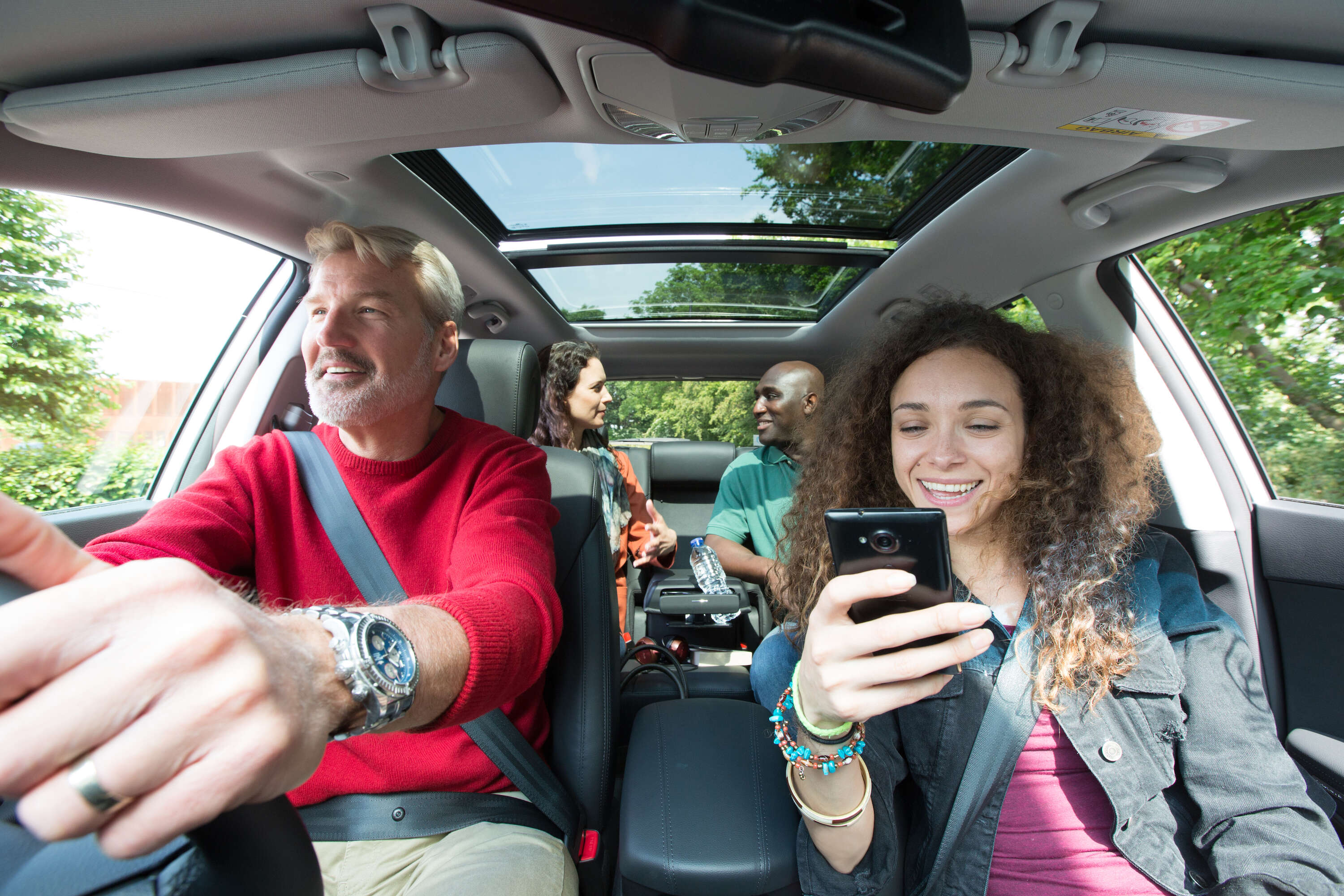 group of people riding together in car using blablacar