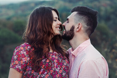 kissing man with beard