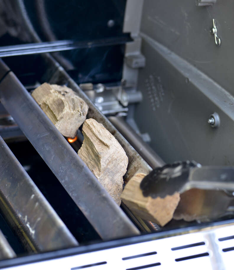 wood chunks on a gas grill