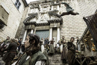 Maisie Williams as Arya Stark in a chase scene across Braavos