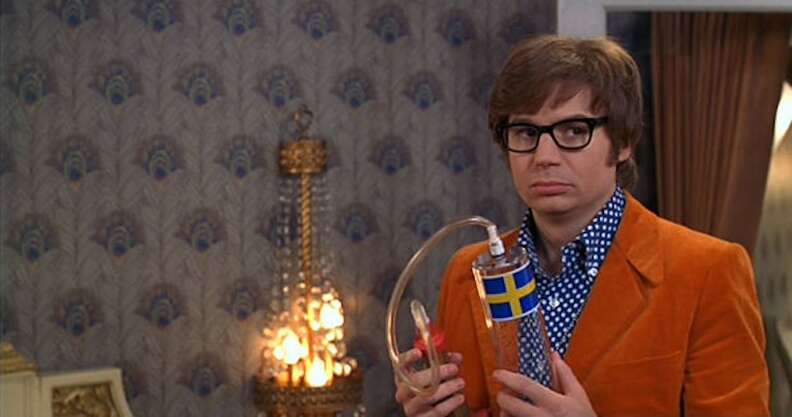 Austin Powers holding a penis enlarger