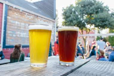 beers in pint glasses outside