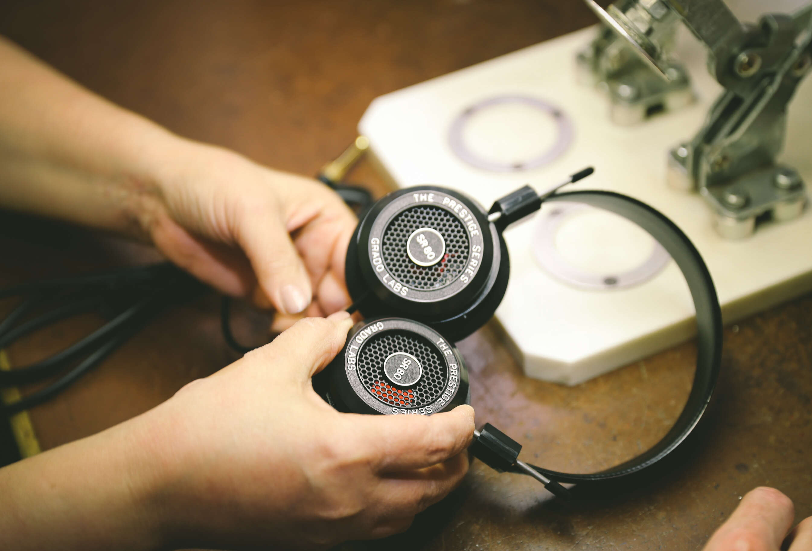 woman making grado headphones