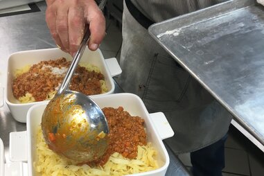 plating fresh pasta bolognese