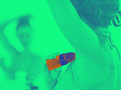 woman applying deodorant mirror