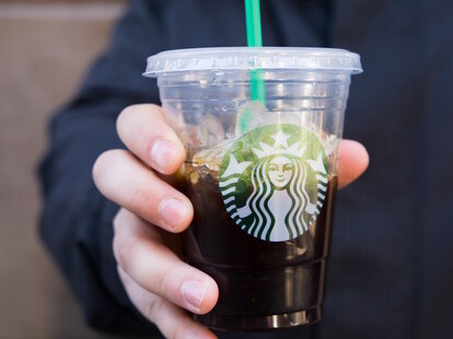 Starbucks cup in hand
