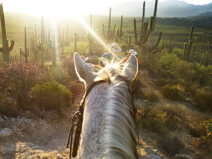 Riding a horse in Arizona