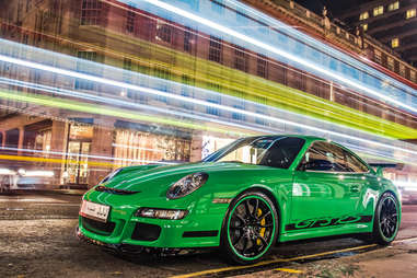 Green Porsche 911 at night