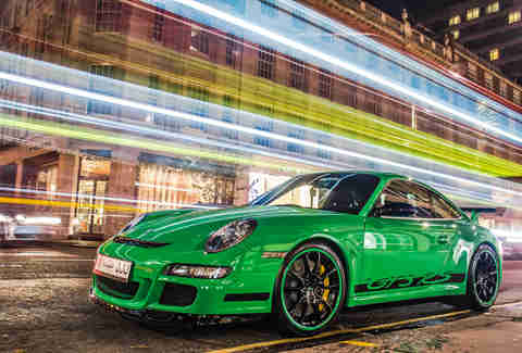 Green Porsche 911 at night