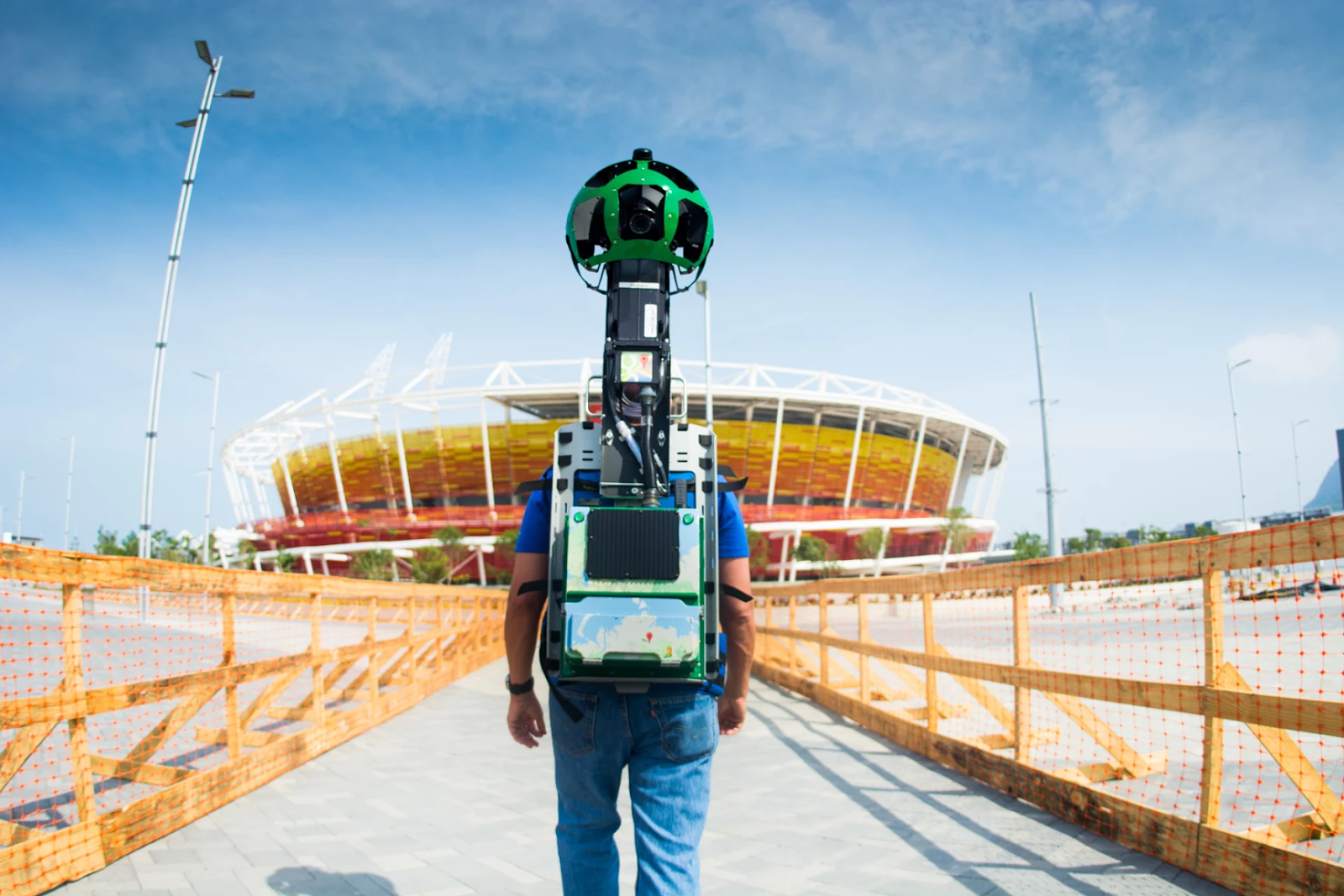 man with google street view camera strapped to back