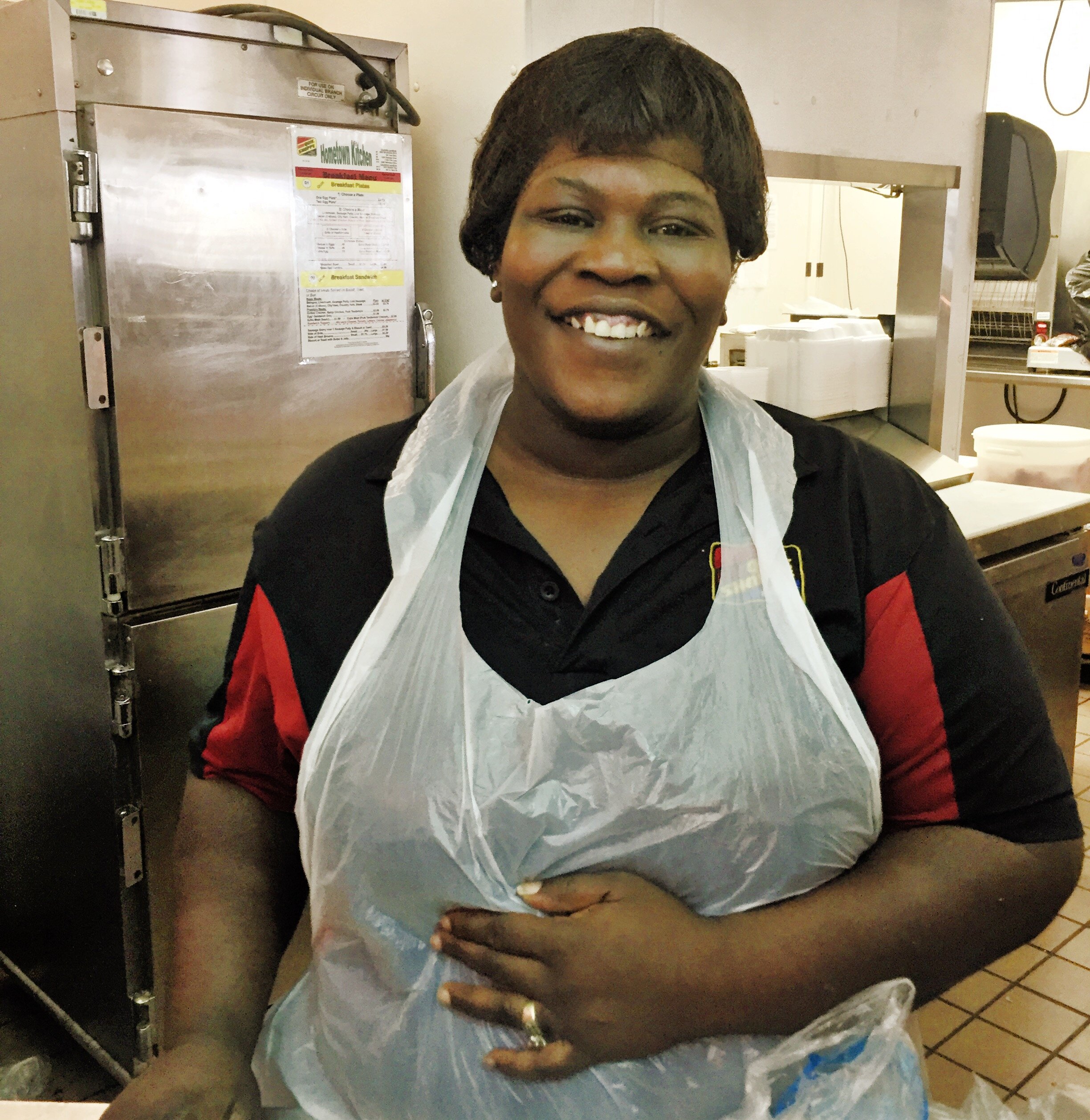 Woman working at chicken shop in Charlotte