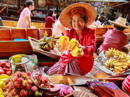 Woman selling fruit in Thailand market