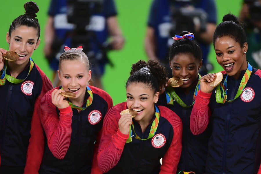 Why Do Olympic Athletes Bite Their Gold Medals? History of Biting Medals at  Olympic Games - Parade