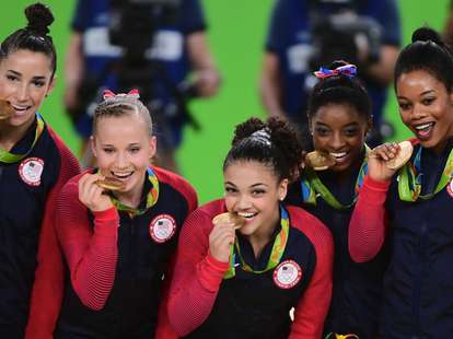 USA women's gymnastics team with gold medals at Rio Olympics 2016
