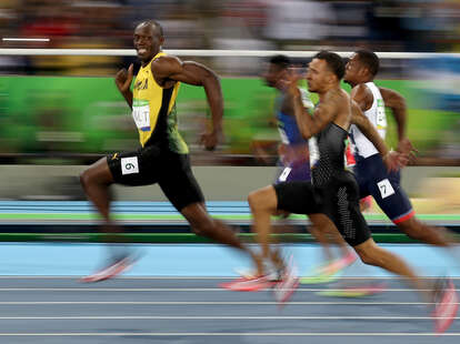 Usain Bolt Smiling During Race Photo