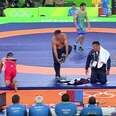 Olympic Wrestling Coach Angrily Strips Down in Front of Judges