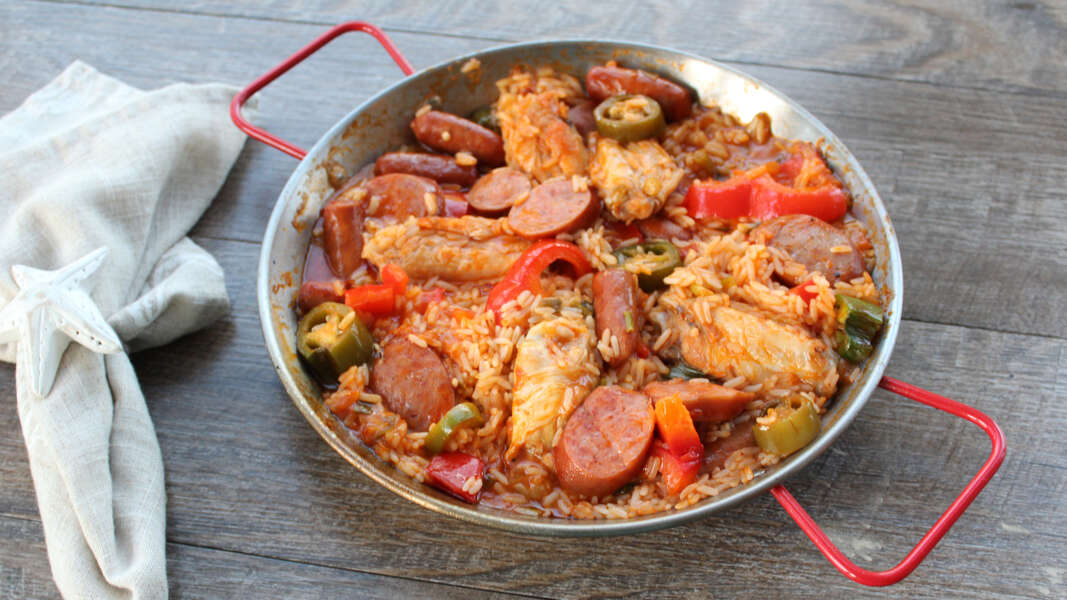 Spicy Smoked Sausage Paella Recipe Video Thrillist