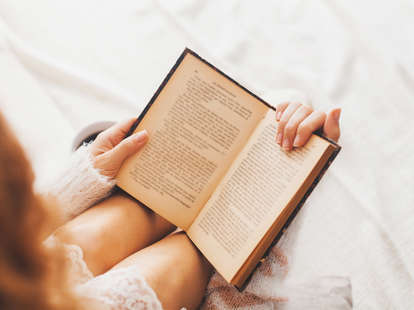 woman reading a book erotica
