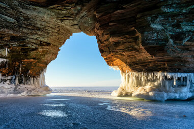 ice-laden shoreline sandstone formations on wisconsin’s apostle islands national lakeshore