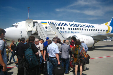 Line to board an airplane
