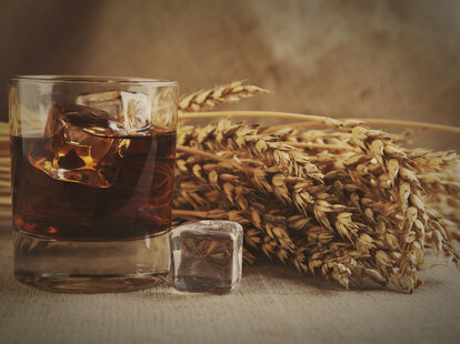 Glass of whiskey and wheat