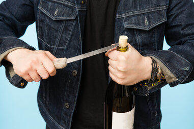 Opening a wine bottle