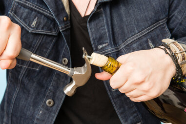 Opening a wine bottle