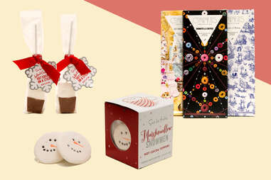 Chocolate bars, snowman beverage toppers, hot cocoa on a stick