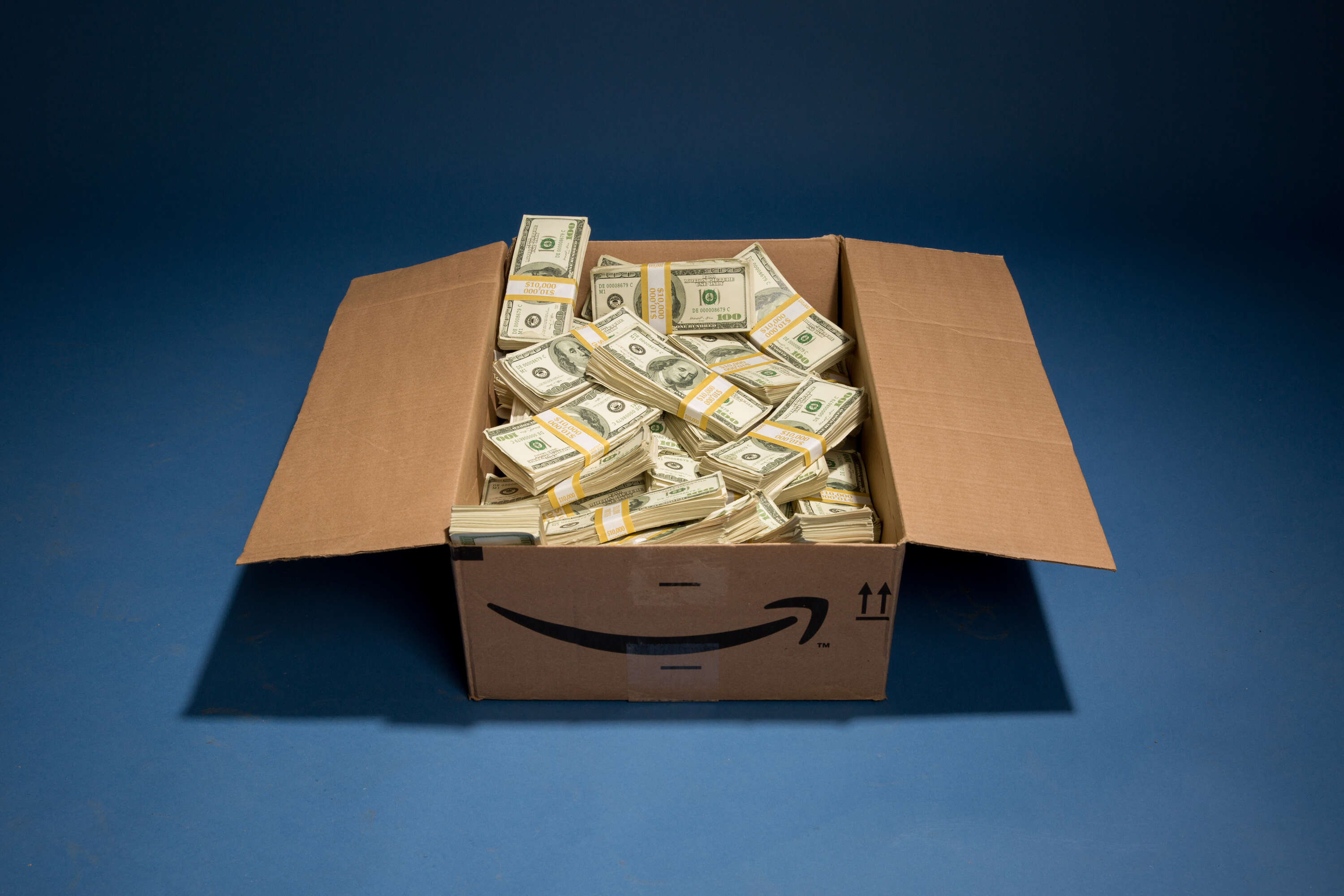 amazon box filled with money