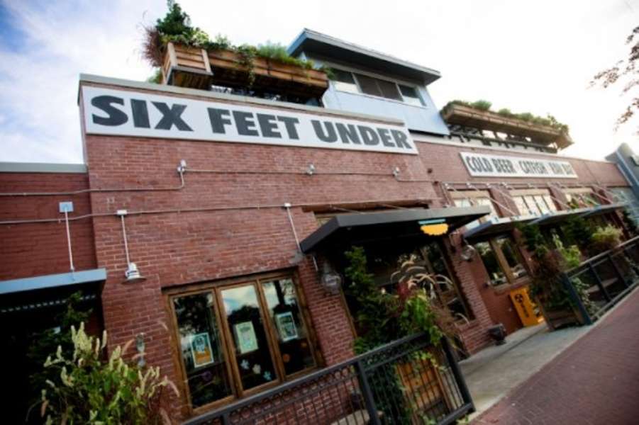 six feet under restaurant        
        <figure class=