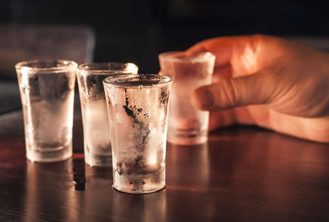How many calories are in a shot of vodka?