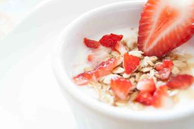 oatmeal in bowl with strawberries