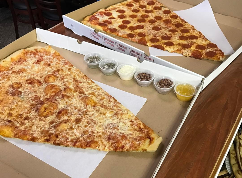 Pizza Barn Of Yonkers Sells A Giant Super Slice Of Pizza For 10 Thrillist