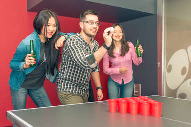 people playing beer pong