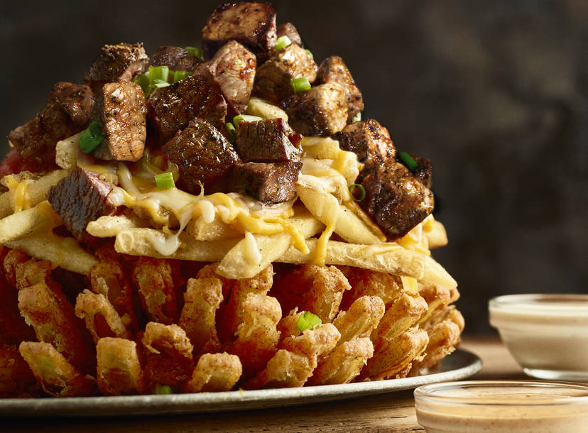 Outback S New 3 Point Bloomin Onion Is Loaded With Cheese Fries Steak Thrillist