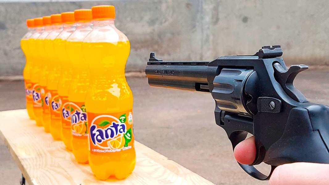 MrGear Shoots Fanta Bottles With Two Guns in Crazy YouTube Video ...