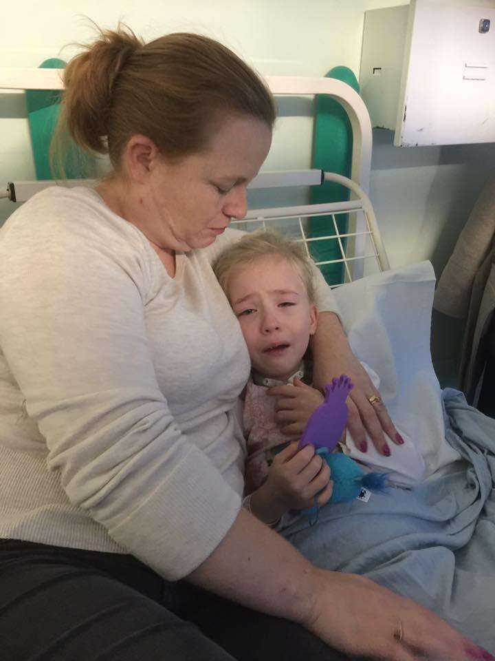 Girl with special needs crying in hospital