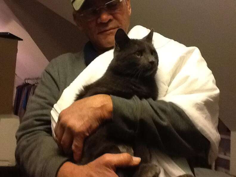 Willie Ortiz with one of the street cats he looks after