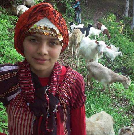 girl with goats