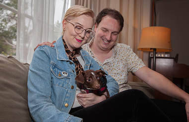 Cletus the dog on family's lap