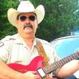Officer Uses Country Crooning To Help Pets Find Forever Homes